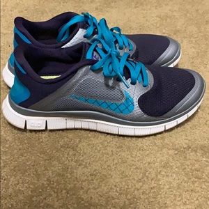 Women’s Nikes; shades of blue with a pattern check